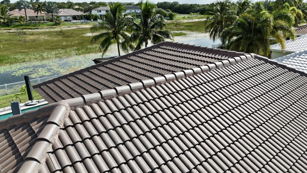 Close-up of a brown concrete tile roof ridge