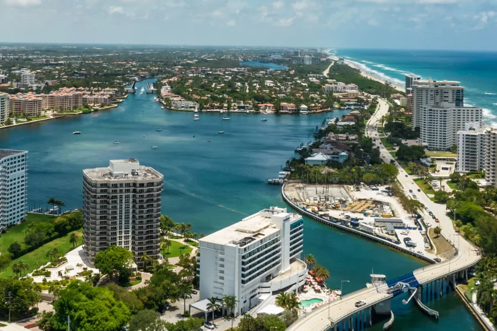 Aerial view of the Boca Raton, FL inlet, waterfront and beachfront towers