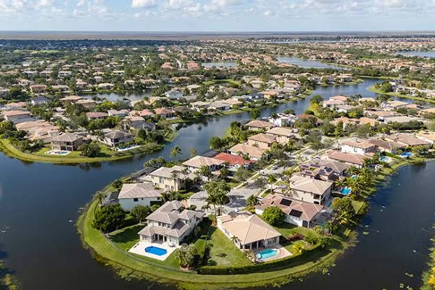 Aerial view of lakefront homes in Parkland, FL